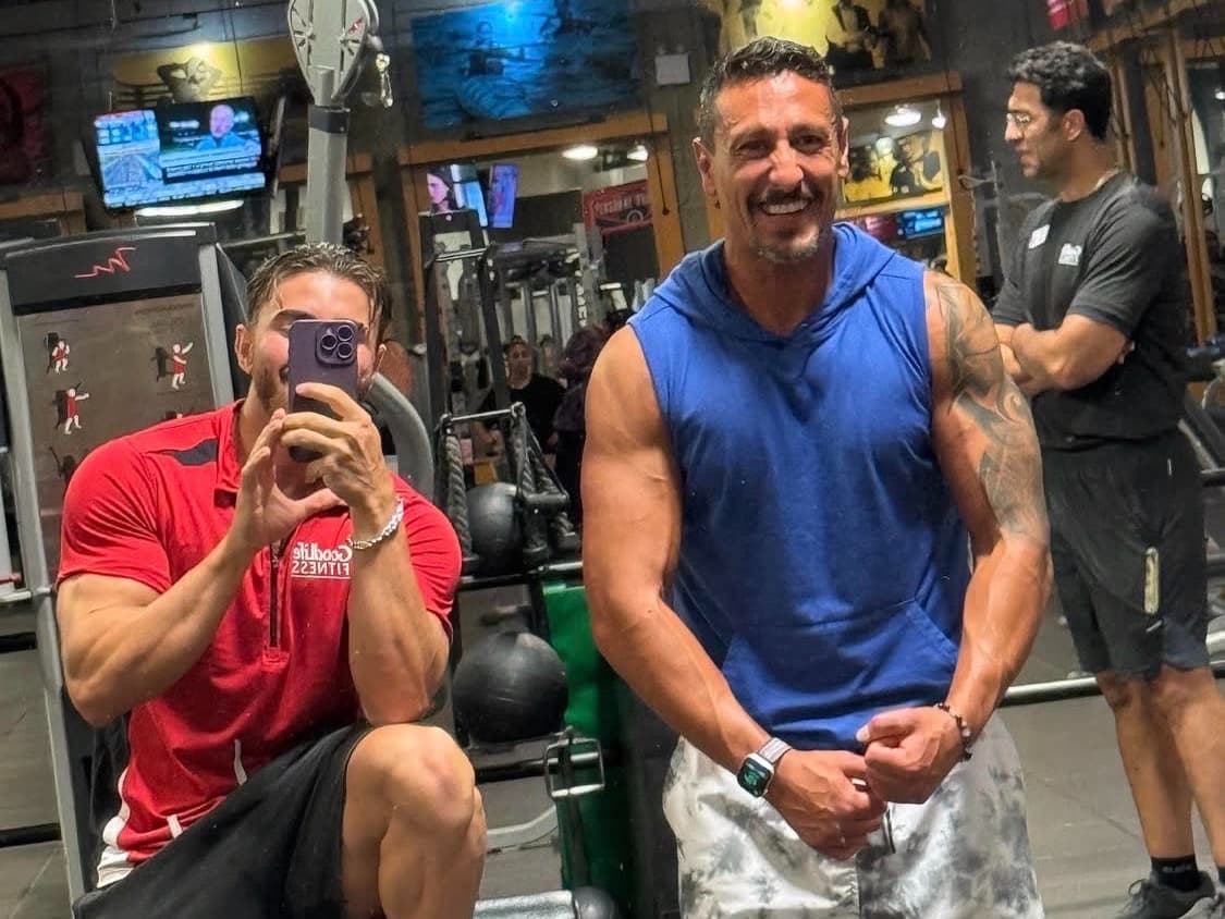 Daniel Yousefi with a client at the gym